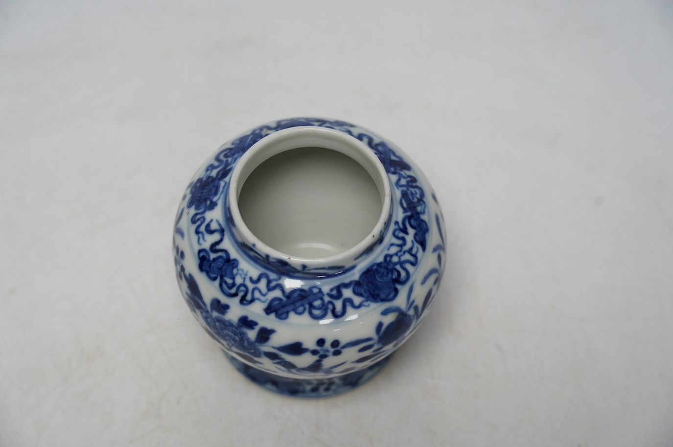 A Chinese bulbous jar, Kangxi mark but later, 9cm. Condition - good